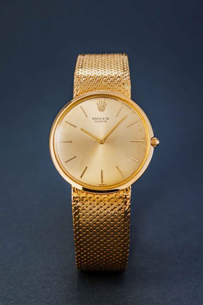 Rolex cellini Geneve 18 K yellow gold with fixed gold band